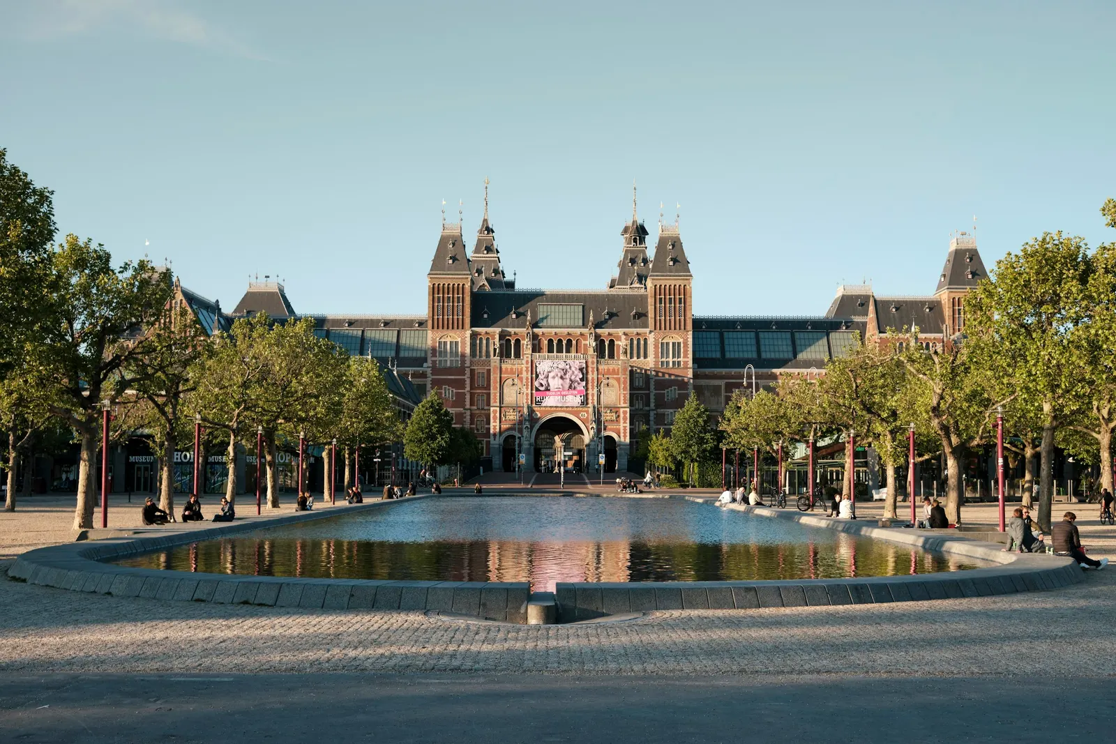 The Rijksmuseum and its reflecting pond on Museumplein in Amsterdam